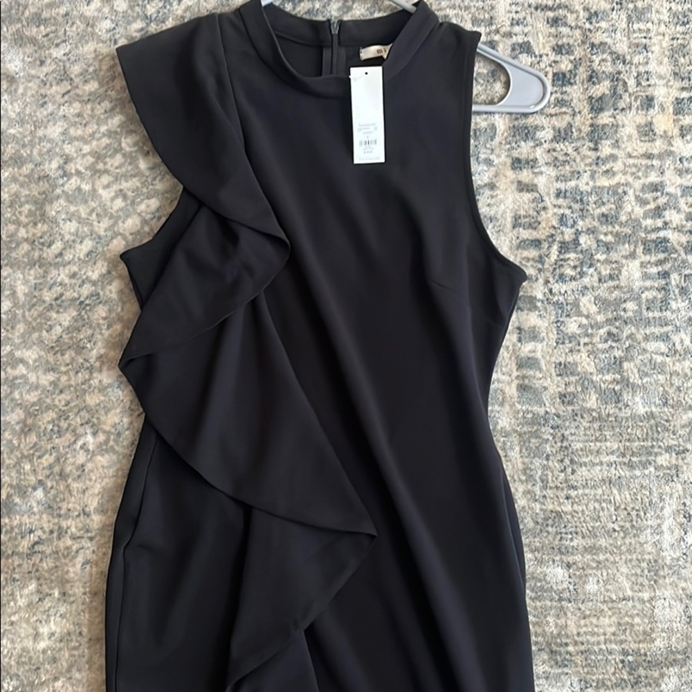 Black cocktail dress with ruffle side